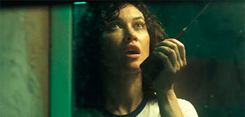Olga Kurylenko’s Every Move is Tracked in Horror ‘O.T.H.E.R’ Trailer